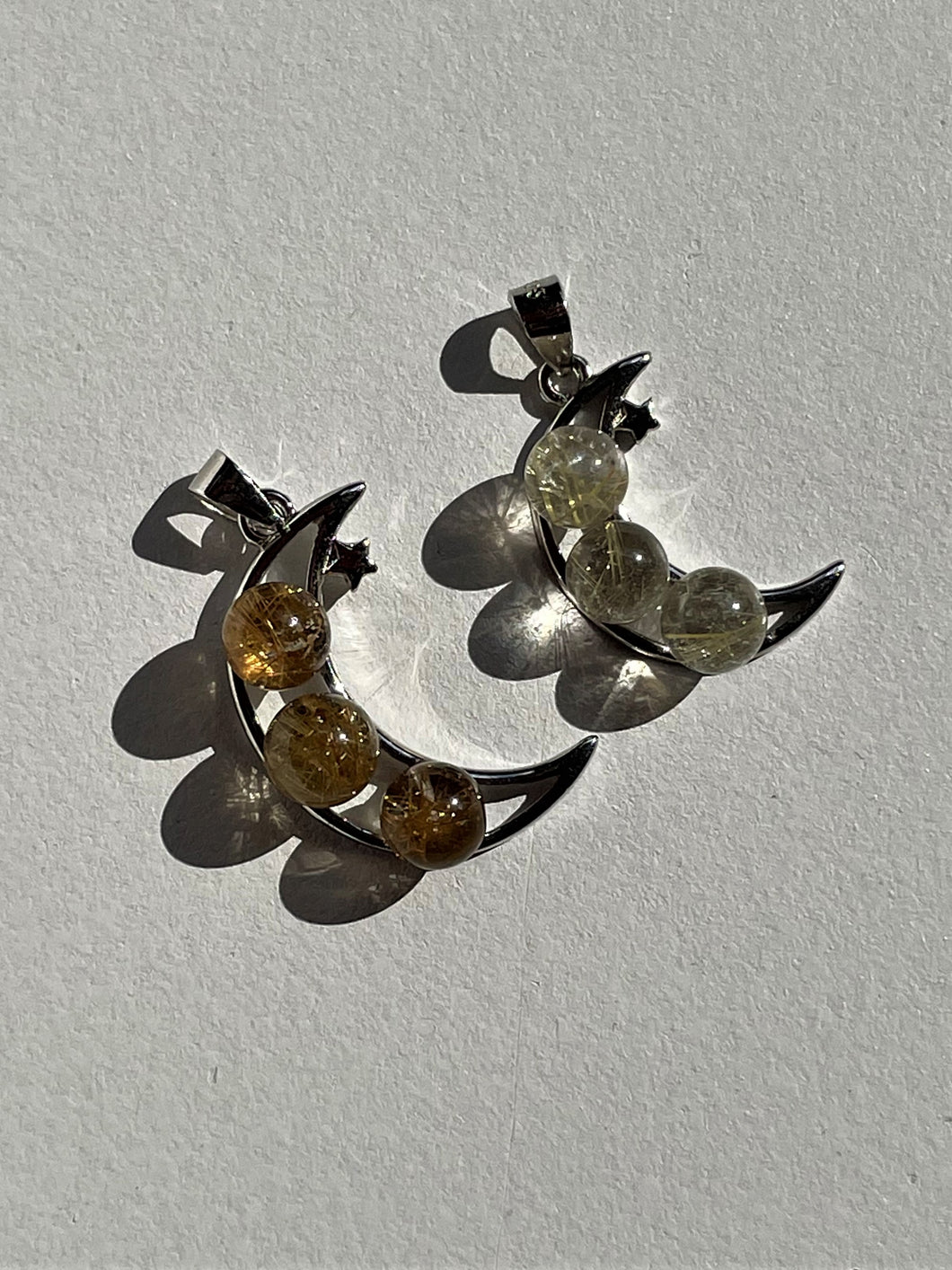 1 x Rutilated Quartz Crystal Moon Pendant PD011